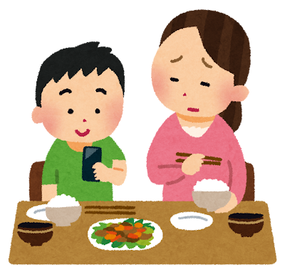 食事中にスマホを使う子ども